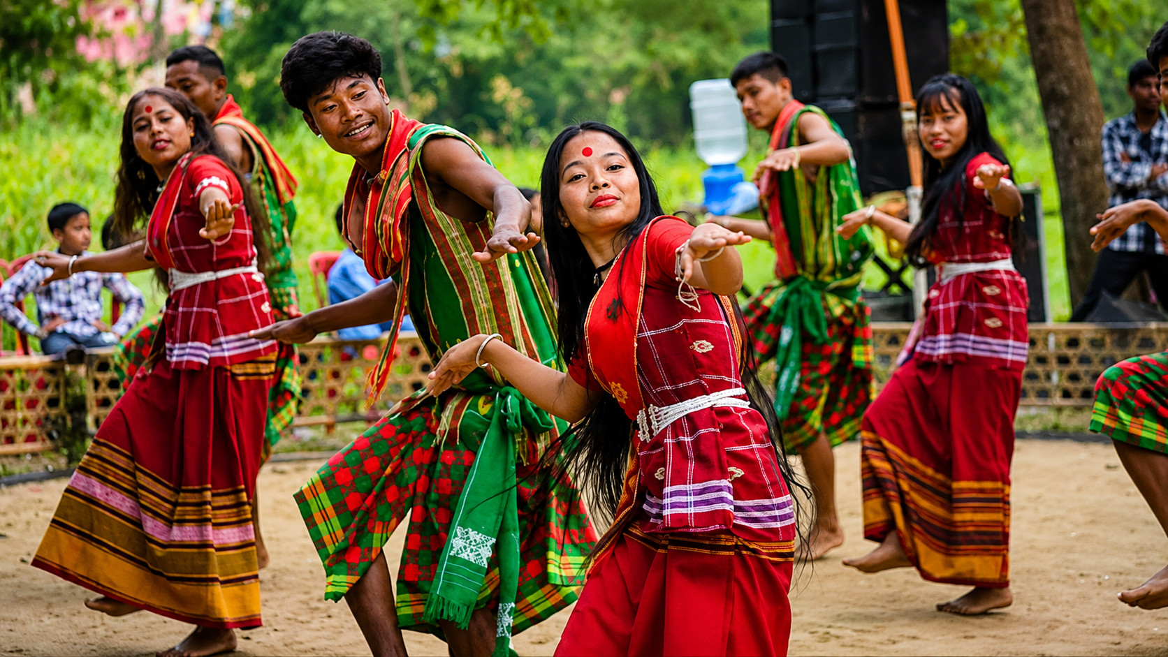 Young Rabha people performing traditional cultural dance in authentic Rabha dress